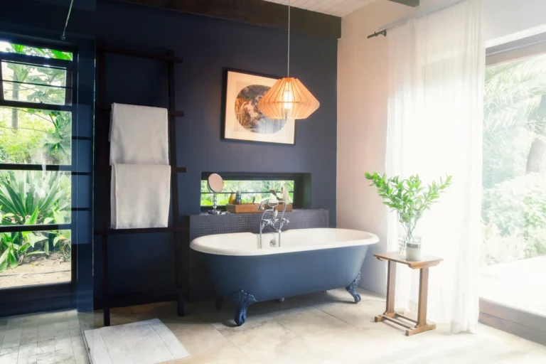 Bathtub and light fixture in modern bathroom