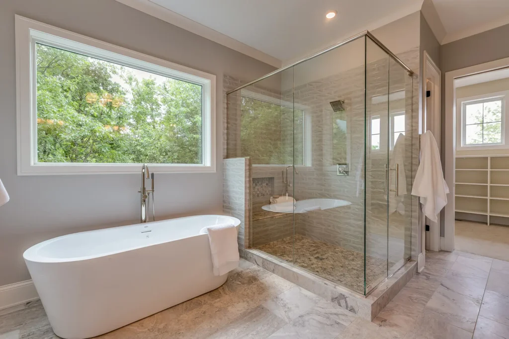 Huge window for natural light in spacious bathroom