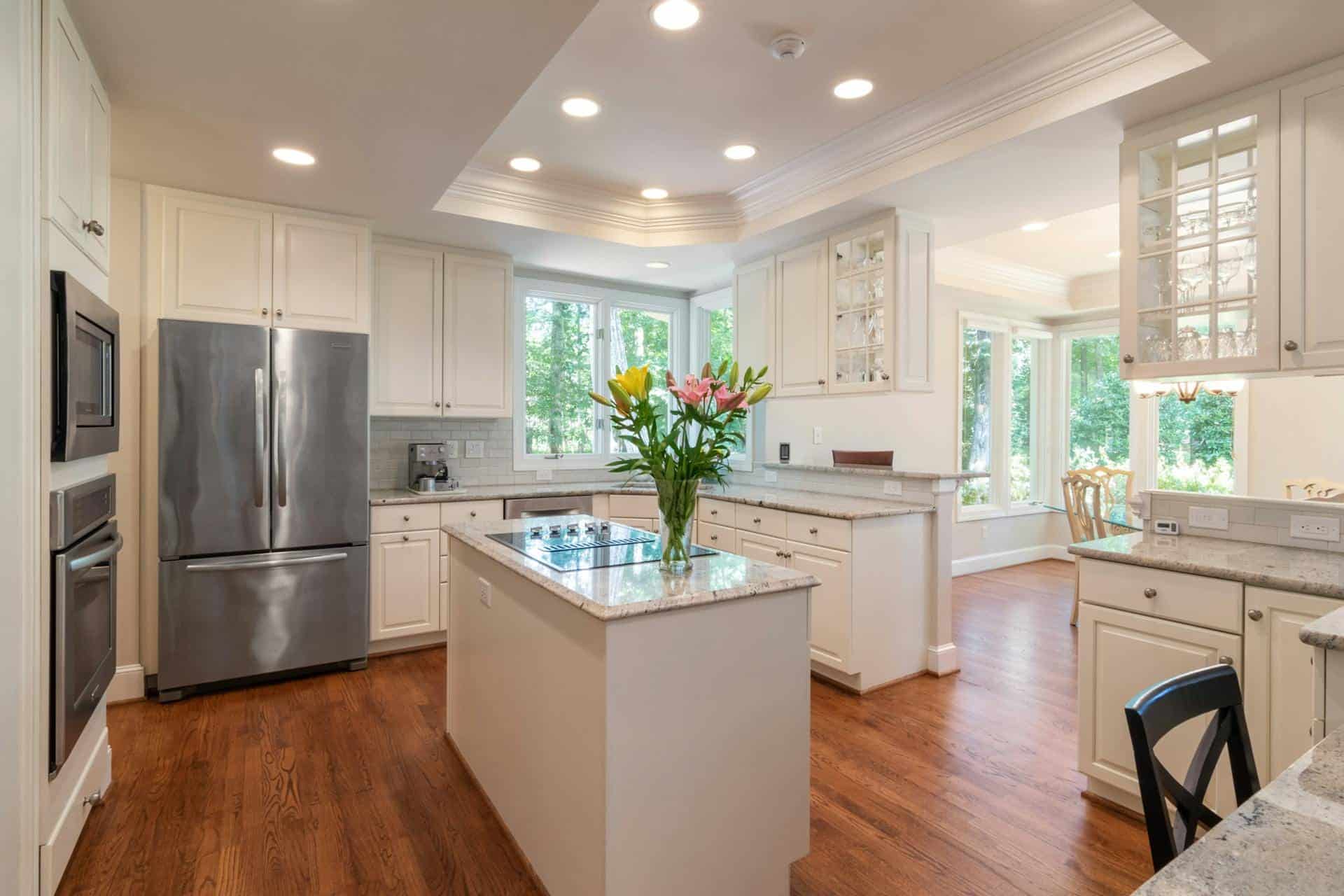 Contemporary kitchen with warm wood tones and island seating