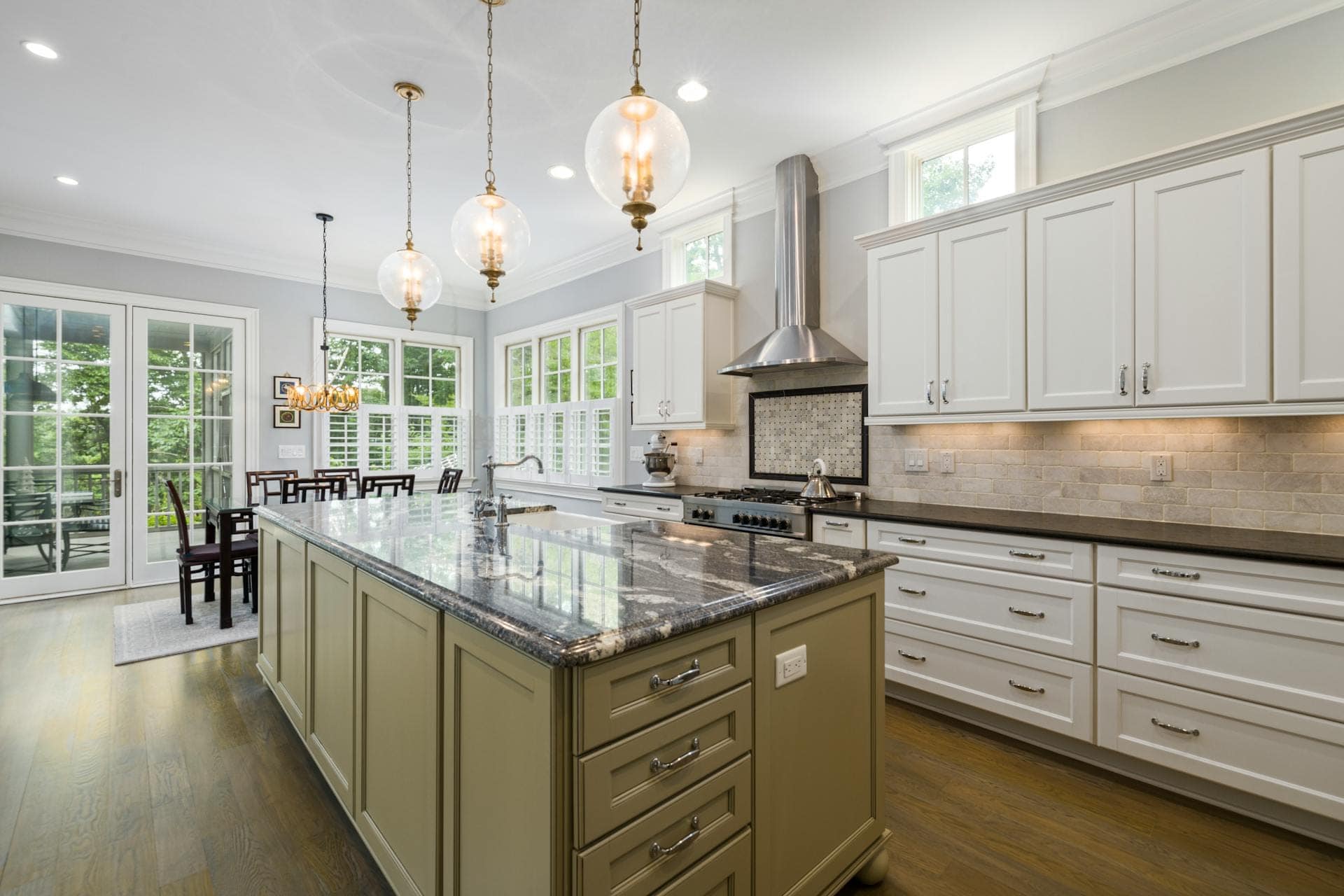 Bright kitchen with a large island and pendant lighting