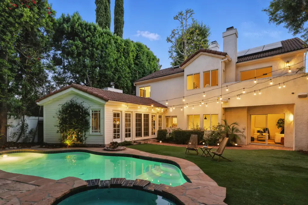 Luxury detached accessory dwelling unit integrated into backyard landscape