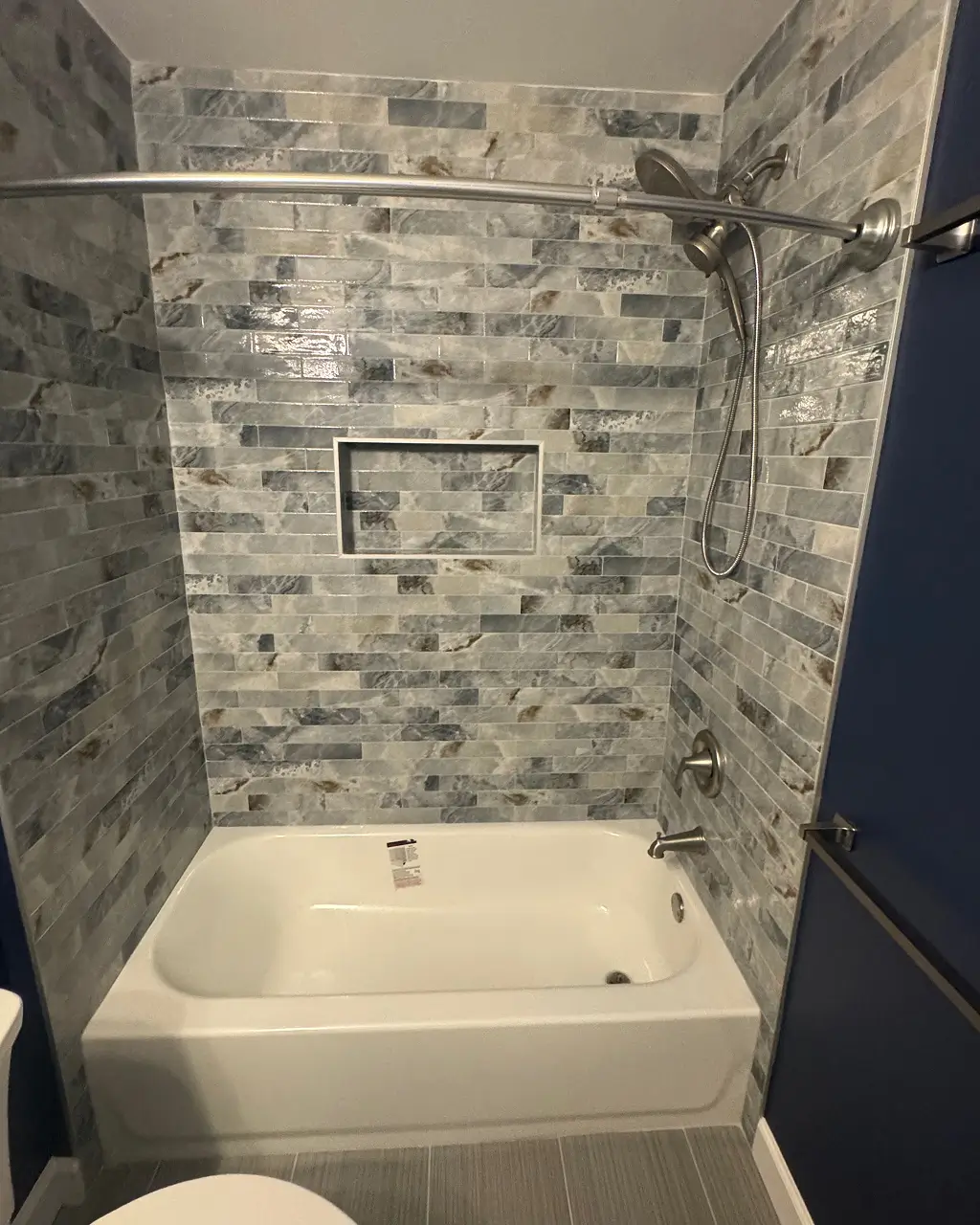 Bathroom renovation with tiled shower and tub in Northern Virginia