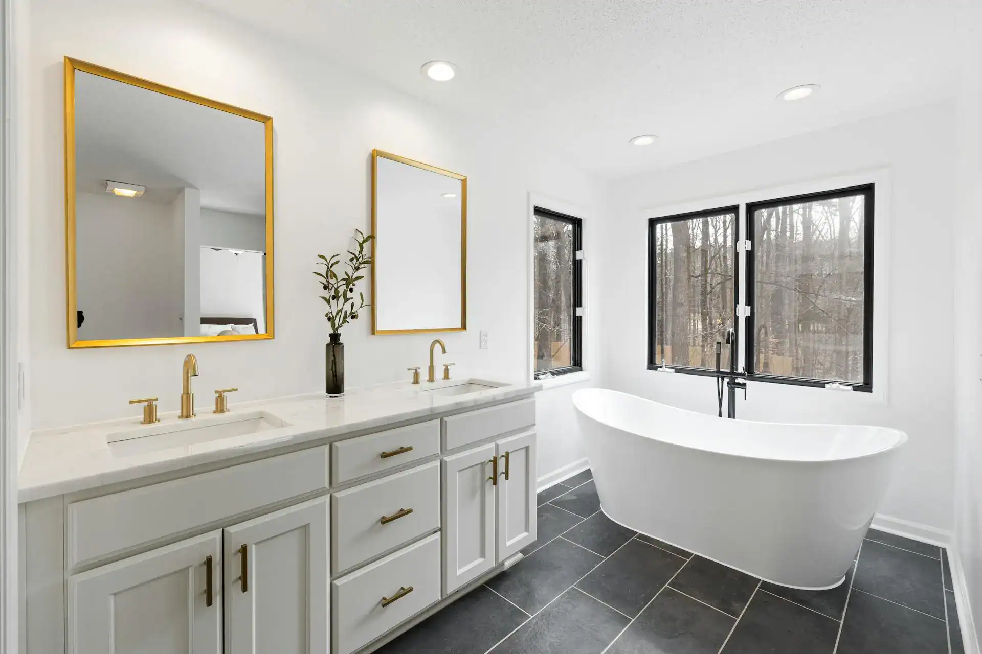 Custom bathroom remodel with frameless glass shower and freestanding tub, a design inspiration for Great Falls, Virginia homes