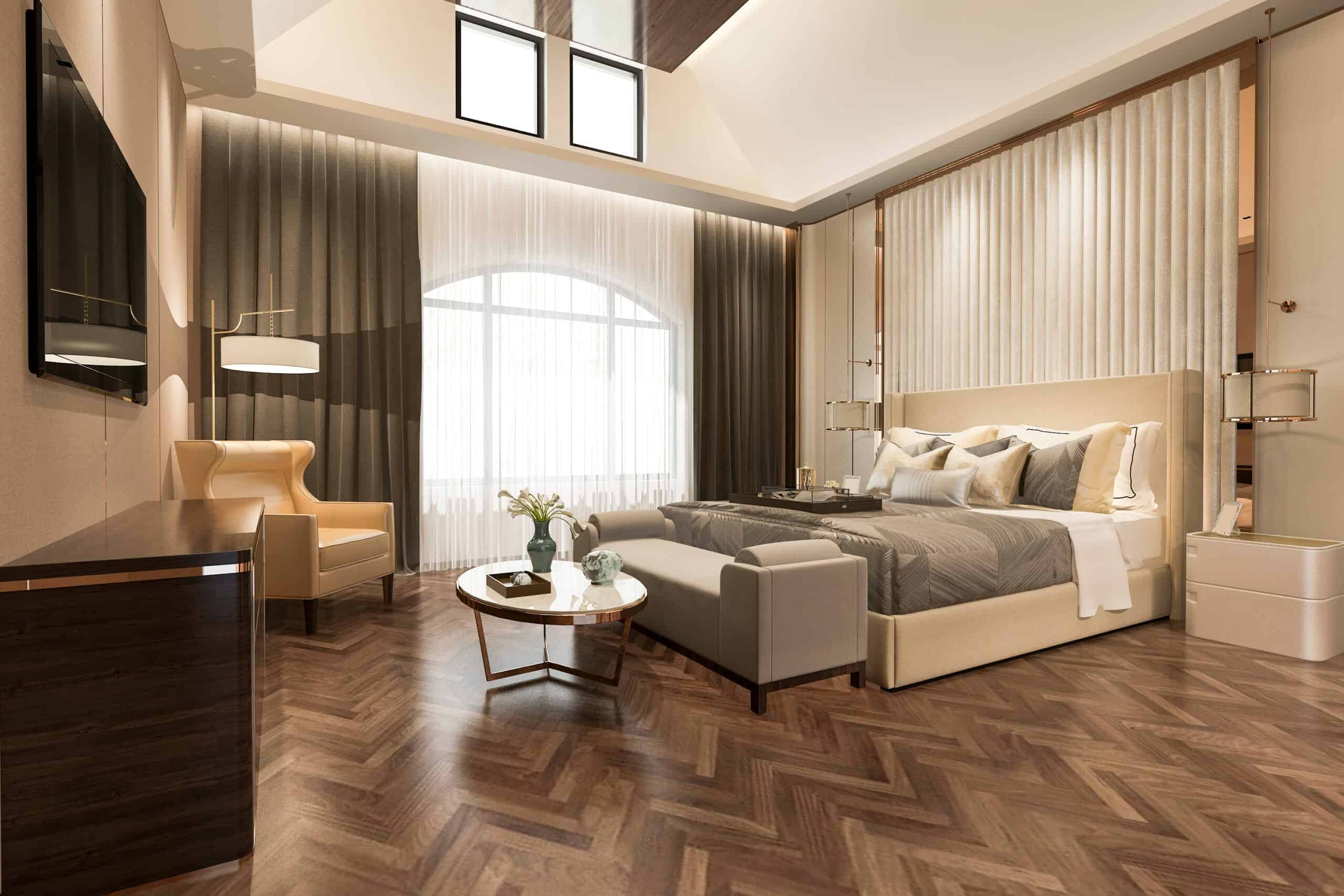 Luxury primary suite with skylight