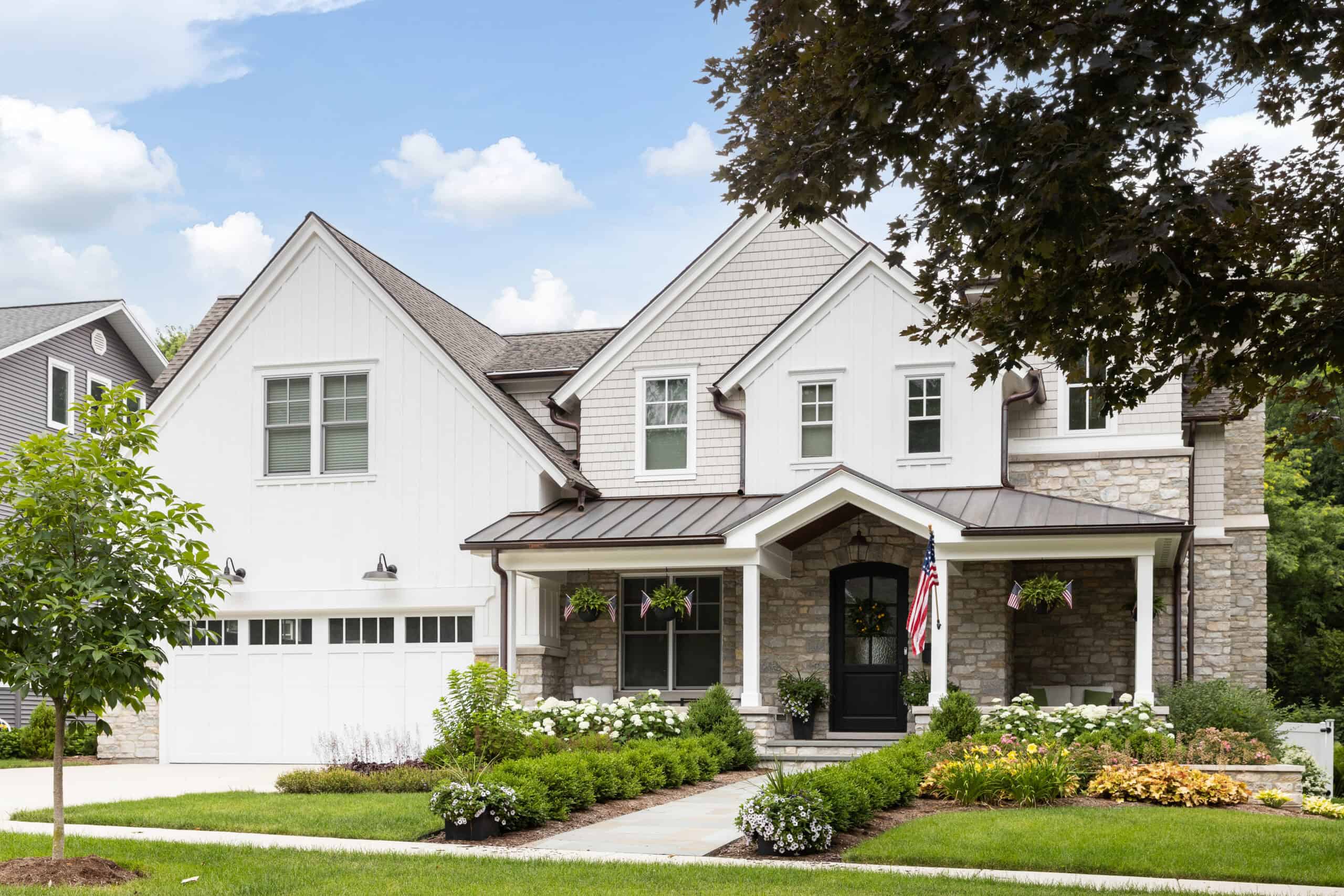 Modern farmhouse with white brick siding - ADU construction in Fairfax County VA